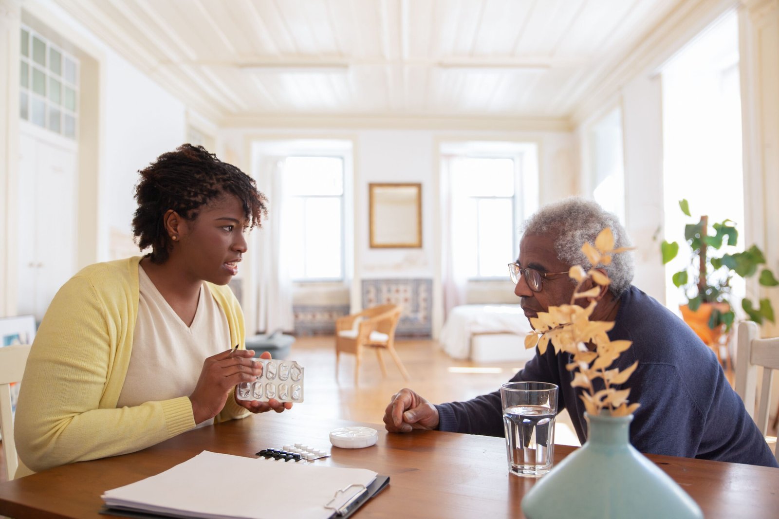 Patient and behavioral health professional reviewing ongoing medication follow-up