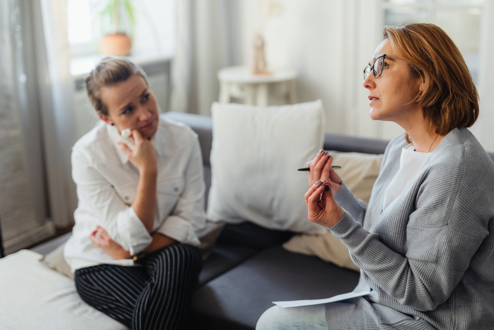 Compassionate behavioral health conversation between a care professional and client